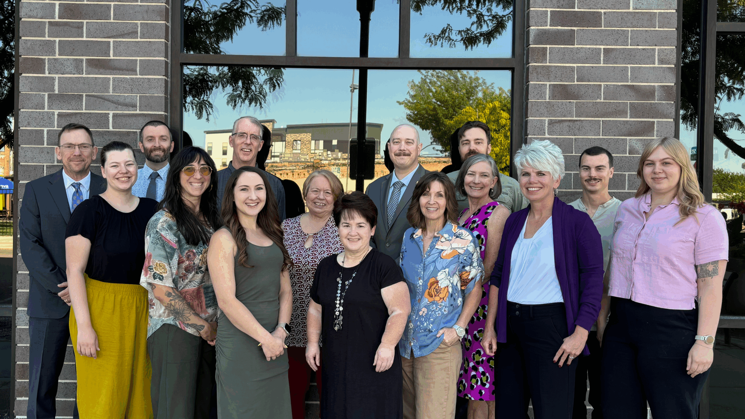 Pictured are COMPASS Staff in order from left to right: Craig Raborn, Olivia Veilstich-McKinnon, Austin Miller, Alexa Roitman, Eric Adolfson, Ashley Cannon, Janet Russel, Teri Gregory, Matt Carlson, Toni Tisdale, Amy Luft, Hunter Mulhall, Megan Sonnen, Brian Crowley, and Josie Gallup